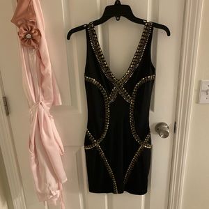 Cute black minidress with beautiful beading design.